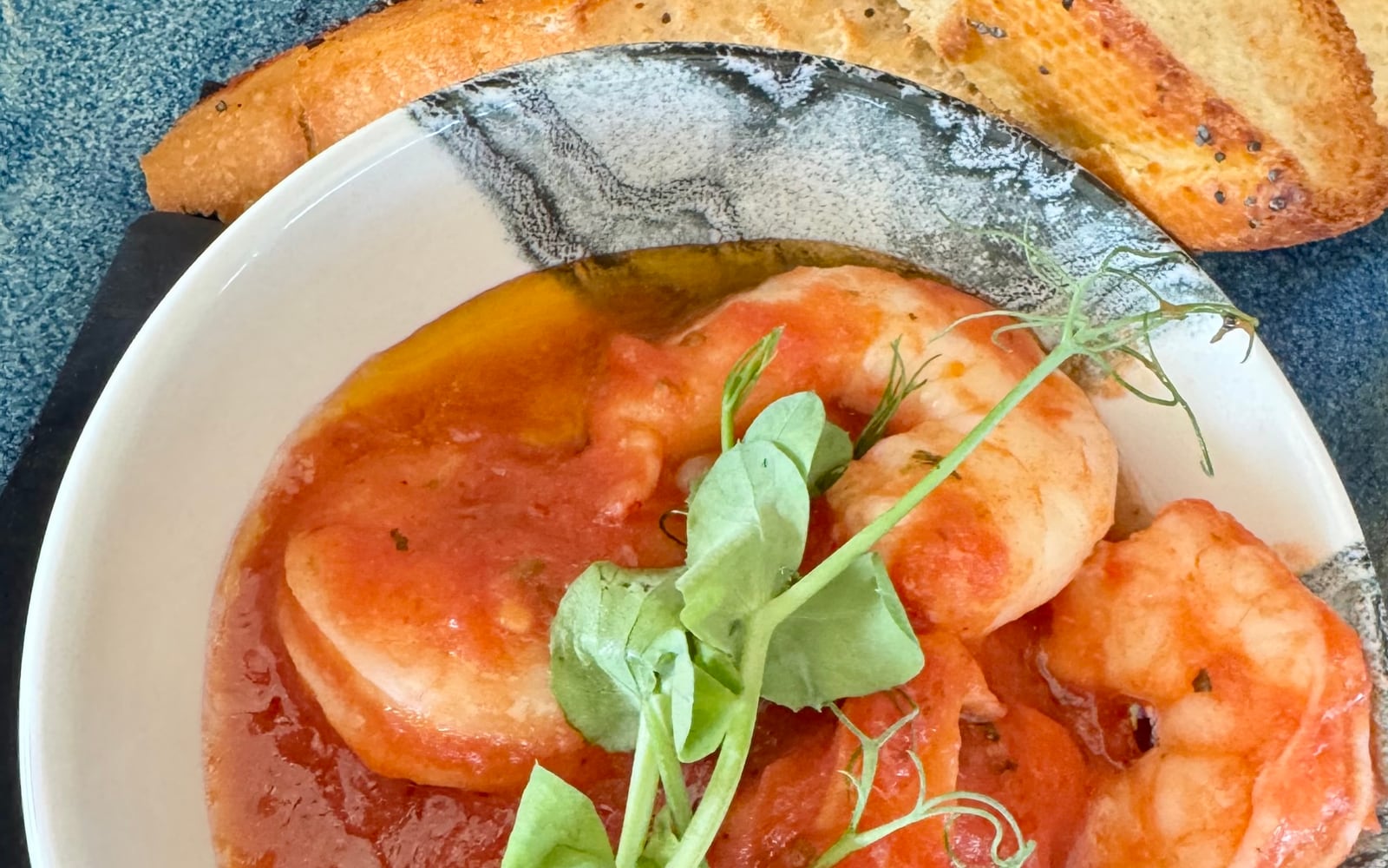 King prawns in a homemade tomato and basil sauce with toasted bread at The Bank at Bude